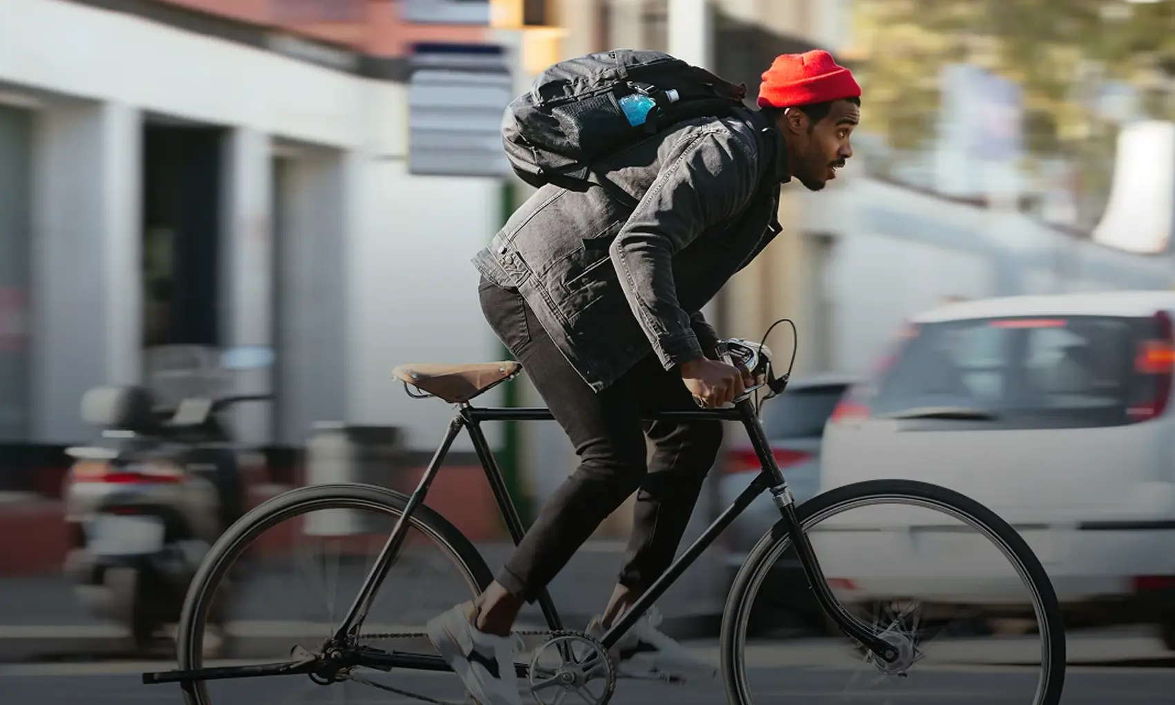 a man riding a bicycle in the city