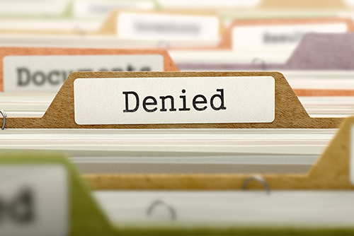 file folder with the word denied