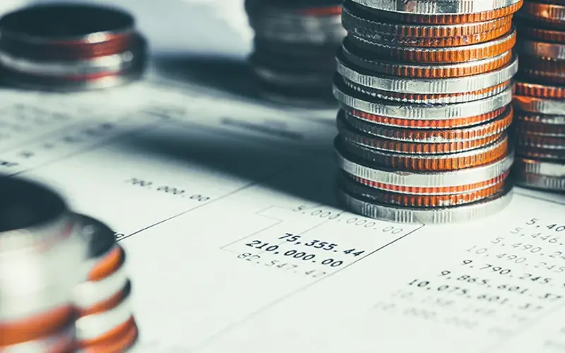 Pile of coins money stack in finance treasury deposit bank account saving