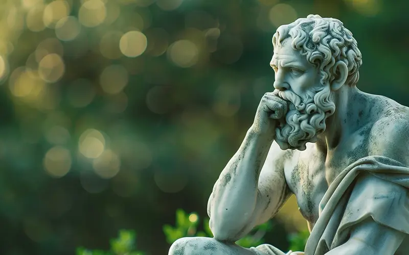 statue of a Greek philosopher thinking