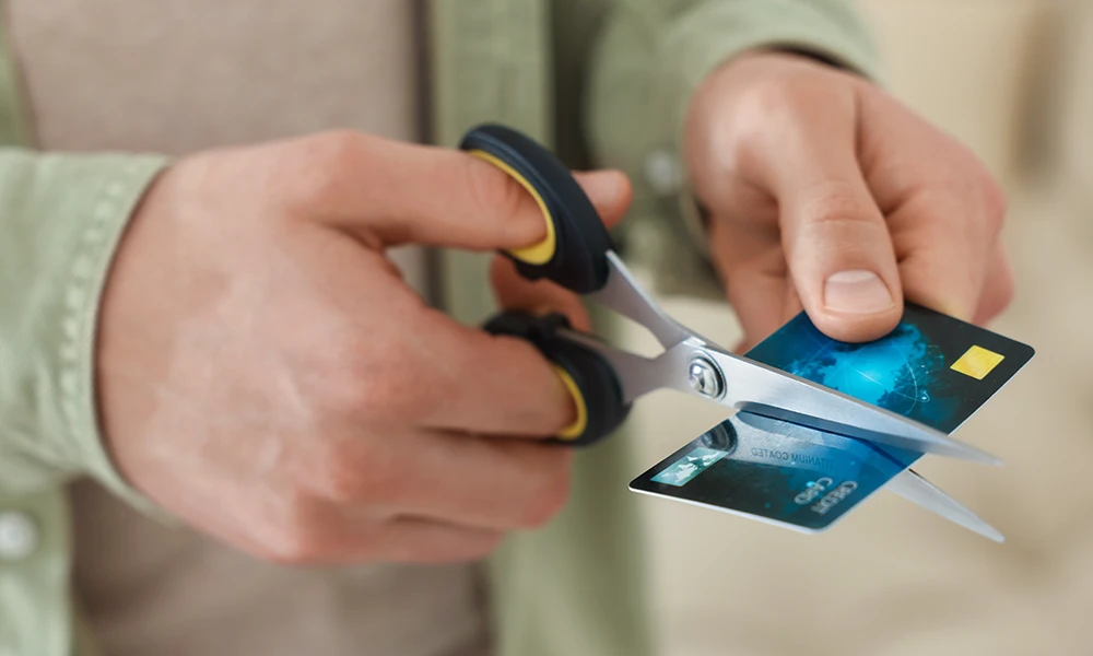 scissors cutting up a credit card