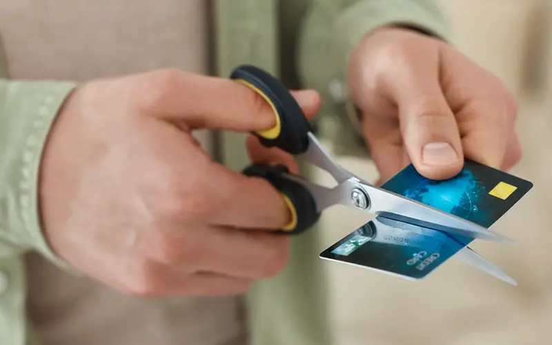 scissors cutting up a credit card