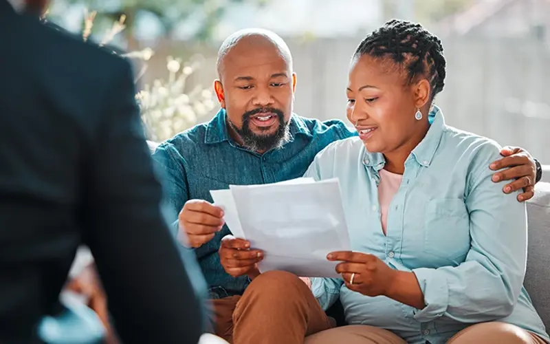 couple reviewing paperwork together
