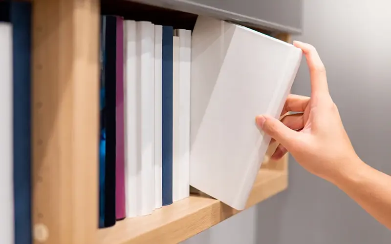 Shelves with books in a library