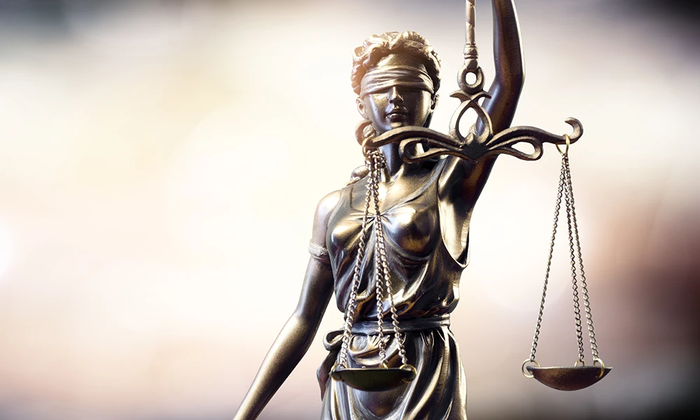 Lady Justice balancing the scales