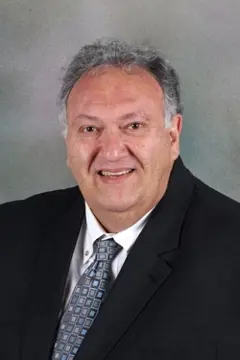 headshot of Louis Giustini