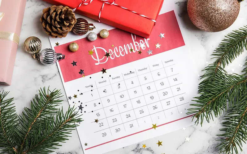 calendar showing December and holiday artifacts