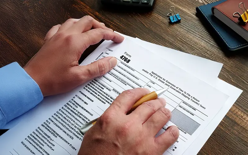 Person reviewing tax form