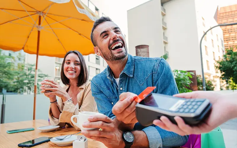 Man paying for meal with Card