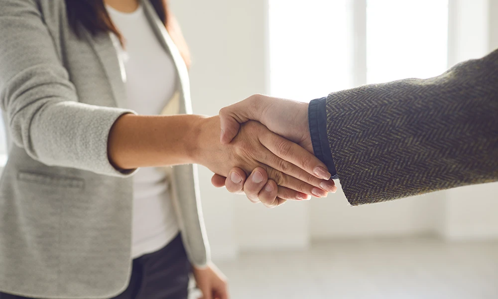two business people shaking hands